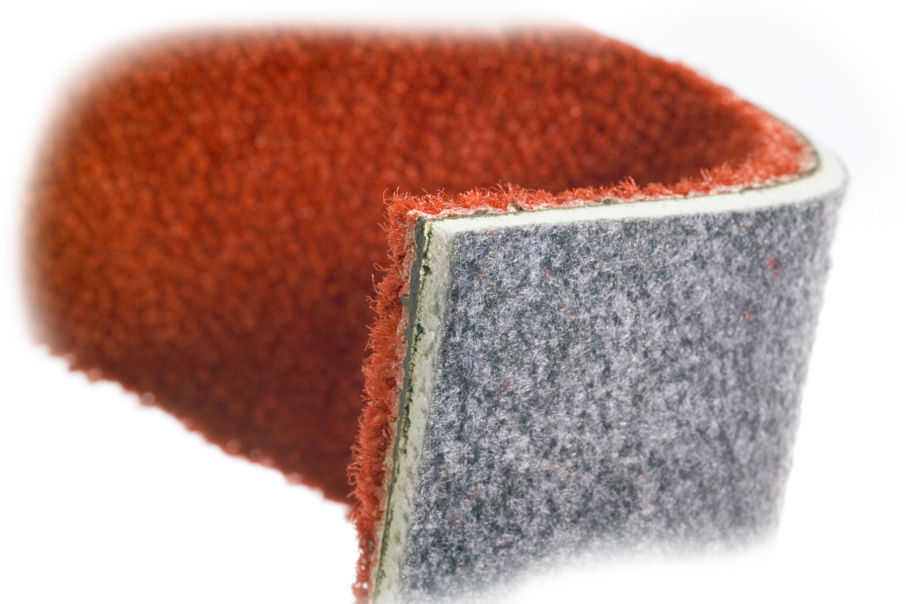 ENHANCER Technology for cushioned modular carpet backing