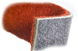 ENHANCER Technology for cushioned modular carpet backing