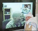 Deployed Soldier Video-Conferenced to Delivery